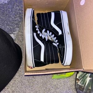 Vans women’s size 7.5 shoes black and white. Barely worn. Jus need to get rid of